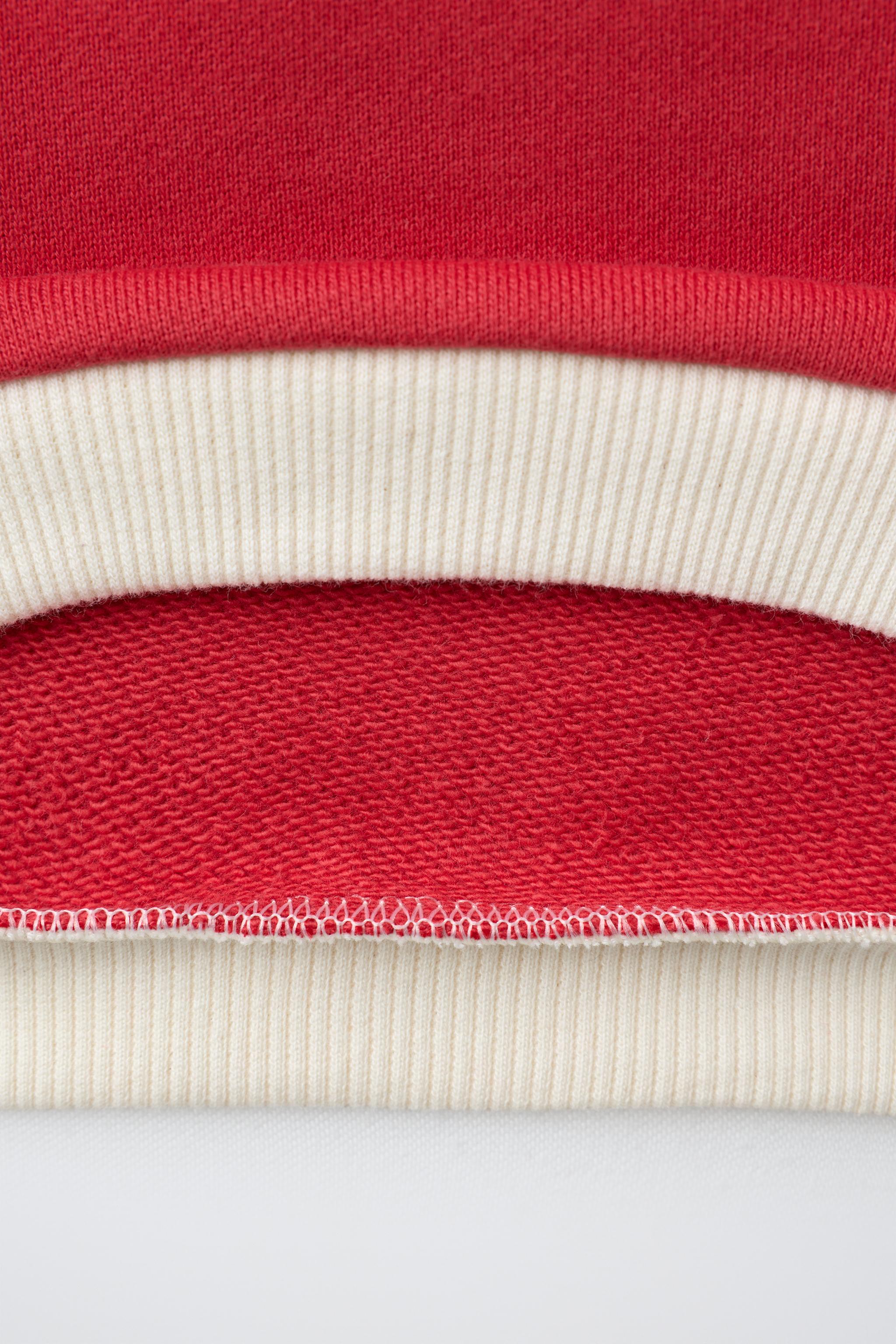 SWEAT BRODÉ EN CONTRASTE FRUIT OF THE LOOM™